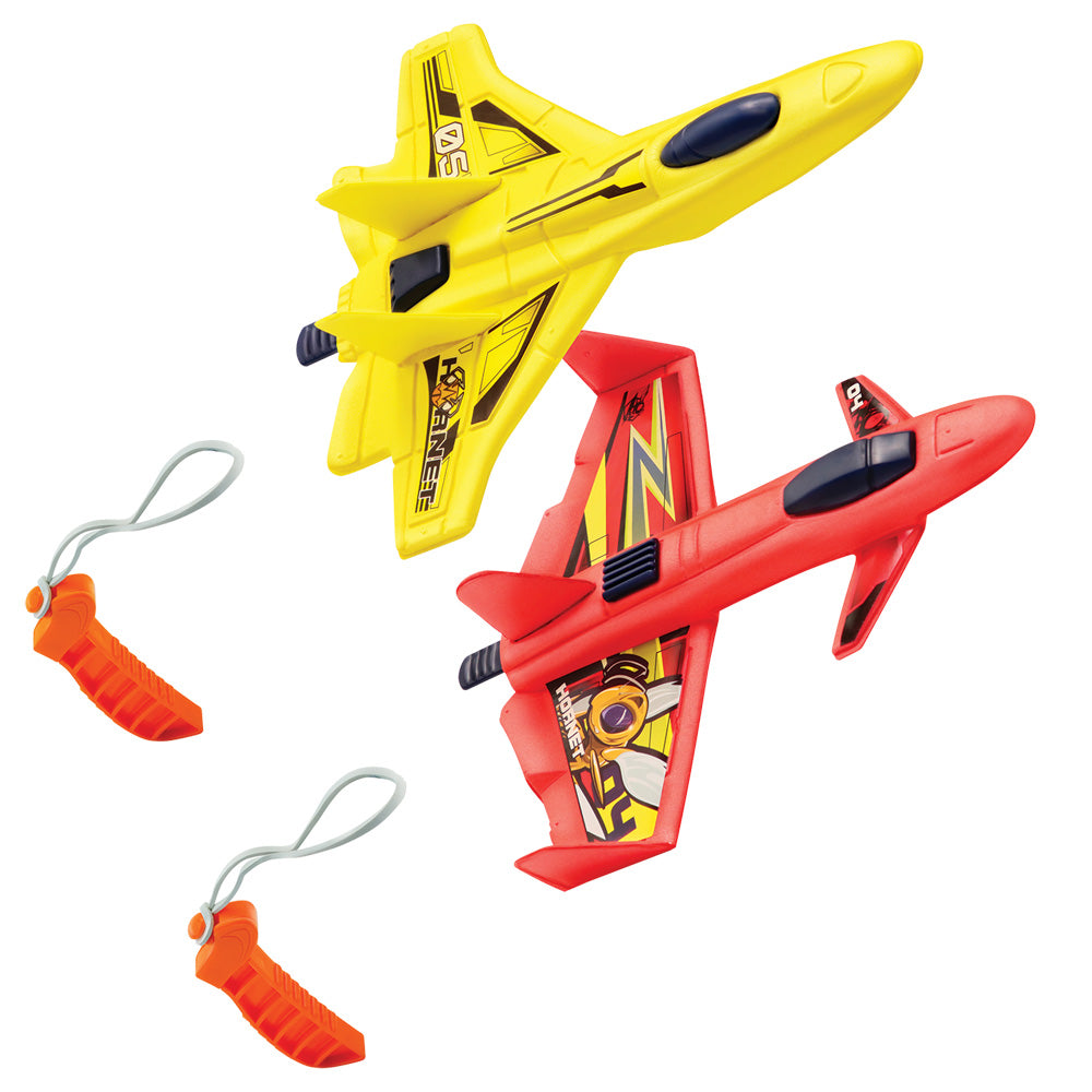 Stunt Flyer Hornet Storm Jet Made from soft, lightweight, aerodynamic foam, these stunt flyers resemble airshow jets and fly up to 40 feet! Ages 4+ Two Assorted Styles Material: Foam Flying Toys Lanard Toys