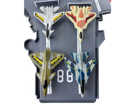 Detail of diecast metal jets for this durable plastic interactive extra large toy aircraft carrier playset. It includes 4 diecast metal jets, flashing runway lights, authentic sounds and a large storage compartment. Electronic Fleet Command Battle Zone brand playset. RedBox / Motormax